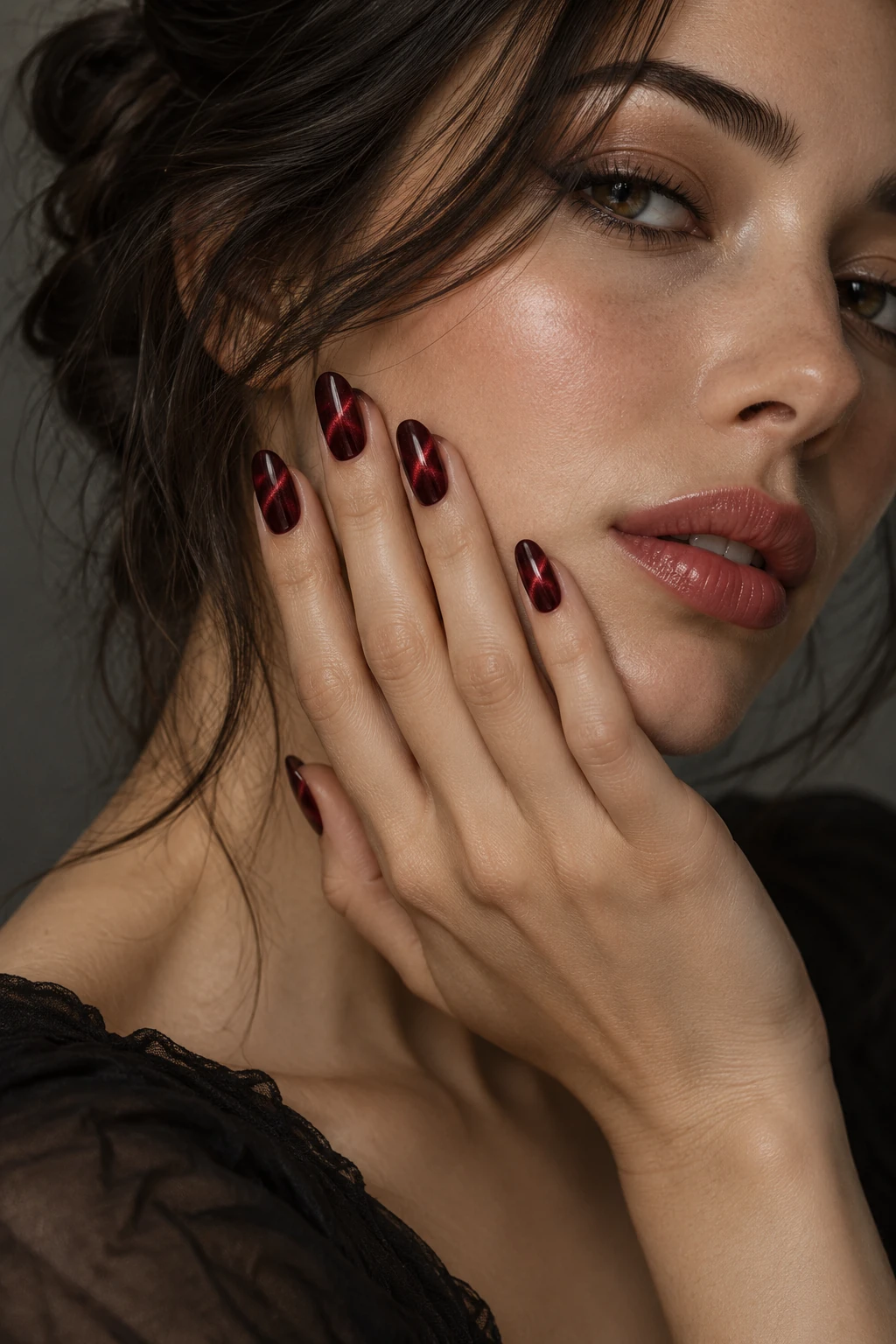 Original oxblood velvet nail inspiration. A narrow red shimmer crosses the deep wine base. Use this as a finish reference rather than proof of a particular magnetic polish.