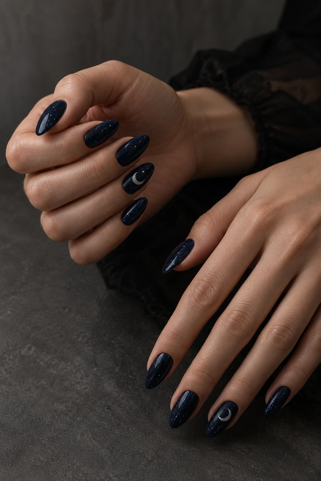 Original moonlit navy nail inspiration. Deep navy, tiny light flecks and a crescent accent suggest a night sky. Keep the navy distinct from a plain black reference.