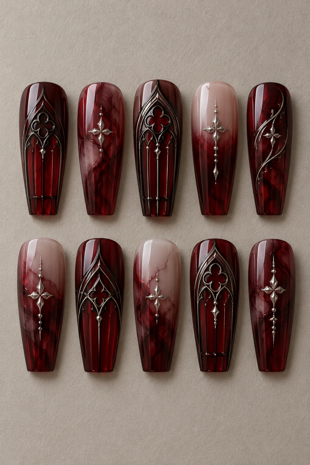 Ten detached long coffin press-on nail tips: ruby cathedral windows.